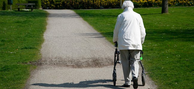 Senior woman with a walking frame.